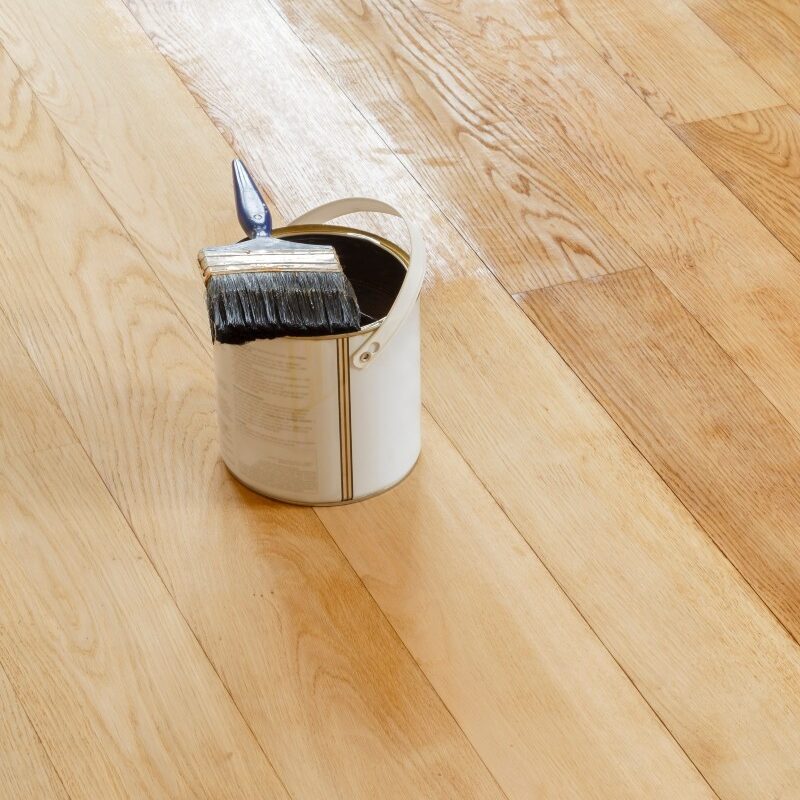 Hardwood Floor Refinishing page image Wood Finish Can on Hardwood Floor